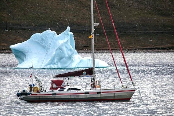 The first visiting sailing vessel of the season pulls into Arctic Bay July 28. The SV Nomad, captained by Austrian couple Doris Renoldner and Wolfgang Slanec, has sailed the world for three years now. The couple spent the weekend exploring the north Baffin community before heading back into the Northwest Passage on their way to Cambridge Bay. (PHOTO BY CLARE KINES) 