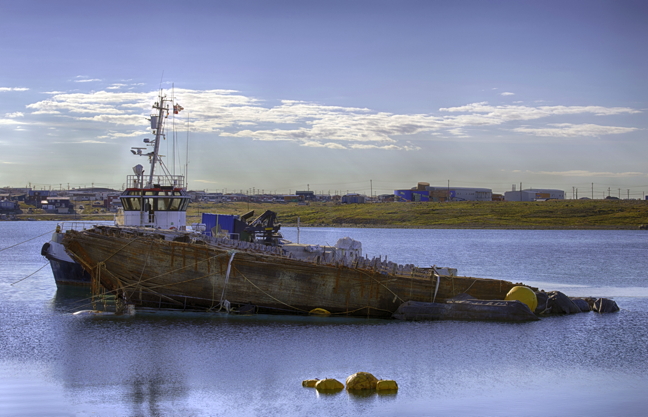 Roald Amundsen's Maud ship has now been successfully, and carefully, placed on a barge which will eventually transfer the historic explorer's ship back to Vollen, Norway. 