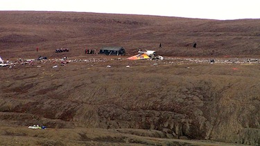 This image shows the wreckage of flight 6560 strewn across a hillside outside of Resolute Bay shortly after the Aug. 20, 2011 crash. (FILE PHOTO) 