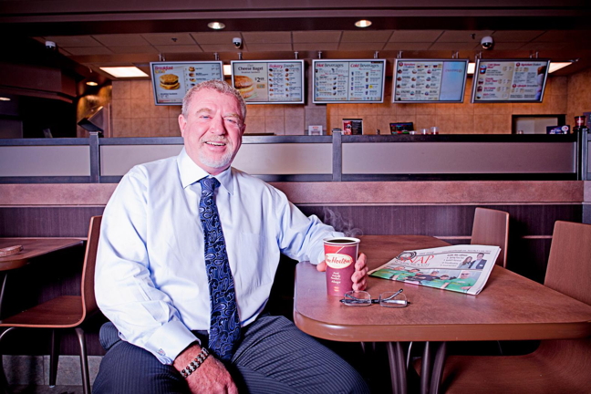 Mark Wafer enjoys a coffee at one of seven Tim Horton's franchises he owns: 17 per cent of his workforce are people with disabilities. Wafer is in Iqaluit Sept. 19 to Sept. 22 to talk to employers, government officials and members of the public about the myths and benefits of inclusive hiring. (PHOTO COURTESY THE CANADIAN HEARING SOCIETY)