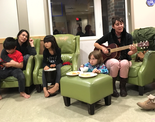 Myriah Graham on guitar leads participants in a song during a youth music night Oct. 20 sponsored by Tungasuvvingat Inuit. (PHOTOS BY COURTNEY EDGAR)