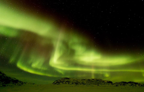 This image by photographer Eric Langdon catches the vibrant green ribbons of the northern lights rippling over Cape Dorset Jan. 18. You can check out more of Langdon's photography on his instagram profile @langdon_eric. (PHOTO BY ERIC LANGDON) 