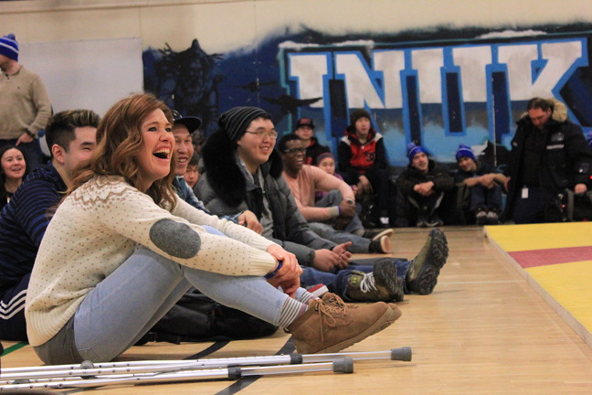 Six-time Olympic medalist Clara Hughes shares a laugh with Inuksuk High School students in Iqaluit Jan. 18 following a Bell Let's Talk event at the school to help raise awareness around mental illness. Hughes, who struggled with alcohol, drugs and depression as a teenager, told students she thought she found a way out with sports but that was just another way to suppress her pain. Hughes was joined on stage by Bell and NorthwesTel representatives as well as members of the Embrace Life Council and Government of Nunavut Health Minister George Hickes, in one of six cross-Canada stops on this year's Let's Talk mental health initiative tour. Read more later on Nunatsiaqonline.ca. (PHOTO BY LISA GREGOIRE)