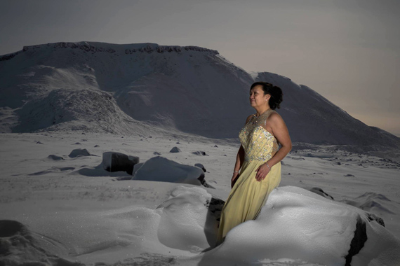 Lily Kigutaq braves the -35C chill Jan. 13 to get this scenic evening shot in front of King George V mountain outside of Arctic Bay. The photo was taken to celebrate Kigutaq's third-place finish in the Miss Arctic Bay contest, hosted in the north Baffin community earlier this month. Jennifer Pauloosie placed second in the competition, while Tina Attagutaluk took first place. (PHOTO BY JACK WILLIE)
