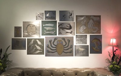 A lounge area in the Drake Hotel features a display of metal etching plates used to print some of Kinngait Studios most iconic images. (PHOTO BY SARAH ROGERS) 