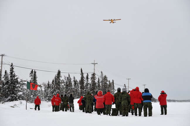 Canadian Rangers and staff watch a demonstration of 440 air squadron landing a twin otter on ice at Long Lake, Yellowknife on Jan 12. About 60 Rangers and 40 Junior Rangers from 1st Canadian Ranger Patrol Group were in Yellowknife last week on an annual leadership training course which helps grow their the skills necessary for supporting the Canadian Armed Forces when they are conducting sovereignty and other domestic operations in the North, said a Jan. 9 Rangers news release. (PHOTO COURTESY 1 CRPG)