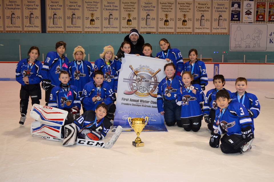 The Kuujjuaq Blue take gold in the Atoms division of the Kuujjuaq Winter Classic Feb. 12, the second year the hockey tournament has taken place in the region. This year’s event hosted 80 youth playing on teams from both Kuujjuaq and Kangirsuk at the Kuujjuaq Forum Feb. 10 to Feb. 12. The hockey tournament, coordinated by volunteers with the Kuujjuaq Minor Hockey Association, wrapped up with a skating party for coaches, players and their families. You can see more photos from the tournament at Nunatsiaq News Facebook page. (PHOTO COURTESY OF MICHEL MARTIN)