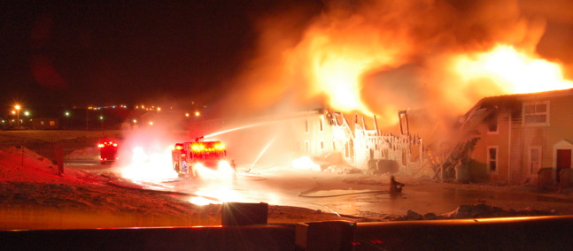 By the time the arson fire at Creekside Village, known as white row, was out on Feb. 27, 2012, it had consumed 22 units and taken two lives. (PHOTO COURTESY IQALUIT FIRE DEPARTMENT)