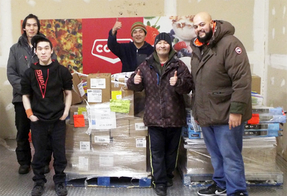 Staff from the Koomiut Co-op in Kugaaruk receive a 2,100 pound shipment March 4 — the first of many new school supplies to the Kitikmeot community, including pens, paper, easels and white boards. Kugaaruk’s only school, Kugaardjuq, was destroyed in a fire Feb. 28, which has left school administrators scrambling to replace lost equipment and supplies so students can get back to class. Arctic Co-ops says it has extended “an open offer for assistance to the co-operative, the Government of Nunavut and Kugaaruk’s MLA” as local organizations recover from the major fire. (PHOTO COURTESY OF KOOMIUT CO-OP)