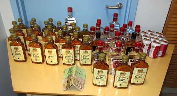 Here's a look at some of the alcohol and money recently seized in Gjoa Haven. (PHOTO COURTESY OF THE RCMP)
