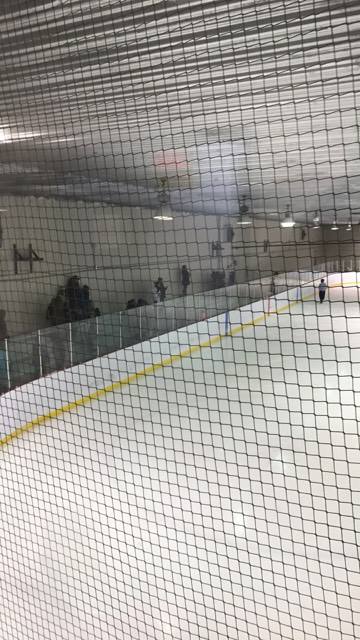 A view from behind the protective netting that surrounds the hockey rink in Puvirnituq. (PHOTO COURTESY OF S. PAQUET) 
