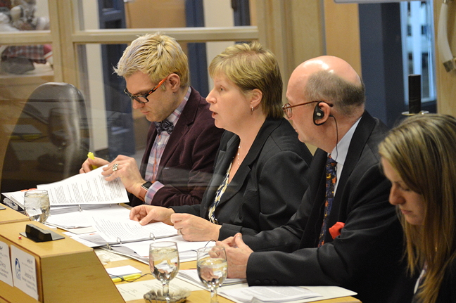 Colleen Stockey, deputy minister of health for the Government of Nunavut, responds to MLAs during committee hearings into a 2016 privacy audit of the Qikiqtani General Hospital which found multiple breaches of patient privacy. (PHOTO BY STEVE DUCHARME)