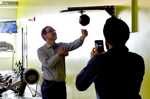 Amarjeet Sohi, MP for Edmonton Mill Woods and the federal minister for Infrastructure and Communities, on a tour of the Iqaluit Aquatic Centre May 5 takes a moment on the speed bag in the centre's fitness room. 