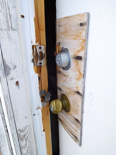 A broken doorframe shows forced entry of a cabin outside Igloolik, one of five break-ins outside the community. (PHOTO COURTESY OF THE RCMP)