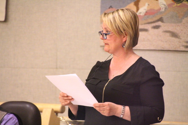 Iqaluit-Niaqunnguu MLA Pat Angnakak and chair of the standing committee that analyzed the Auditor General of Canada's audit of Nunavut healthcare, delivers the committee's report in the Nunavut legislature June 5 and makes recommendations on how to address problems outlined by the auditor general. (PHOTO BY BETH BROWN)