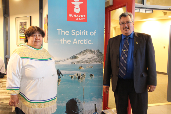 Nunavut Economic Development and Transportation Minister Monica Ell-Kanayuk, left, helps launch the territorial government’s new tourism marketing arm June 7 at the Legislative Assembly in Iqaluit, alongside Baker Lake MLA Simeon Mikkungwak. The new agency, called Destination Nunavut, is promoting the “spirit of the Arctic” in its new campaign, using northern motifs selected by Nunavimmiut such dog teams, northern lights and traditional crafts, to draw visitors to Nunavut. You can visit its new website at DestinationNunavut.ca. (PHOTO BY BETH BROWN) 