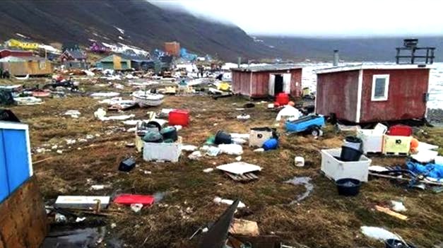 The people of Nunavut's neighbour, Greenland, are in shock and mourning over an early June 18 tsunami that left two people seriously injured, seven slightly injured, and four people still missing on the northwestern coast of the island. Eleven houses in the village of Nuugaatsiaq, population about 100, were completely destroyed, with several swept out to sea. Greenland's Prime Minister Kim Kielsen said June 18 on Facebook that 