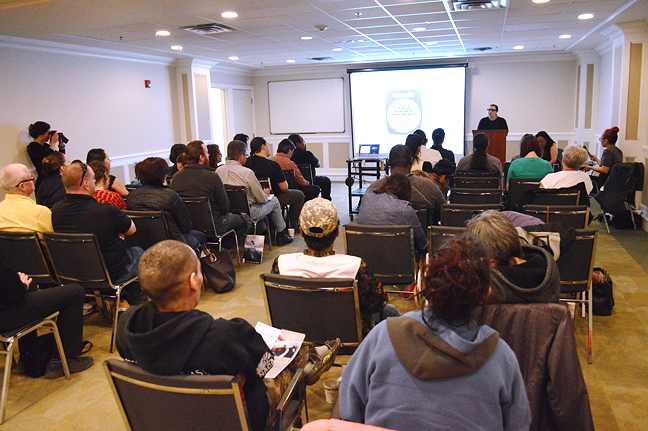 A crowd gathers at Iqaluit's Hotel Arctic July 7 to hear details of the new Inuit-controlled