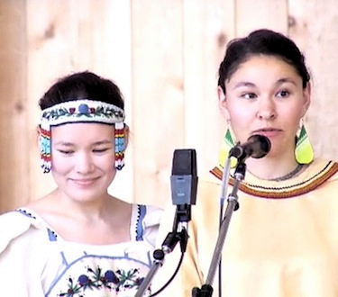 Throat singers Charlotte and Abby Carleton prepare to perform towards the end of the Aug. 3, 2016 launch of the MMIWG inquiry. (FILE PHOTO) 