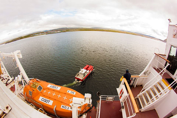 A barge heads out from the Coast Guard's research vessel, the Amundsen, Aug. 22 towards the village of Umiujaq. The boat will pick up participants as part of the Qanuilirpitaa health survey that's touring Nunavik from now until early October. The Amundsen sails up the Hudson coast to Inukjuak Aug. 24. (PHOTO BY DENIS GRANGHON)
