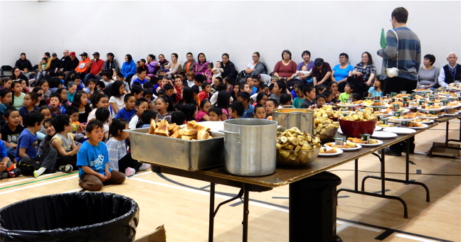 Students gather in the gym of Inuujaq School in Arctic Bay to celebrate the start of the school year Aug. 14 with a breakfast feast with parents, community members and the RCMP. (PHOTO COURTESY ABDUS SALAM)