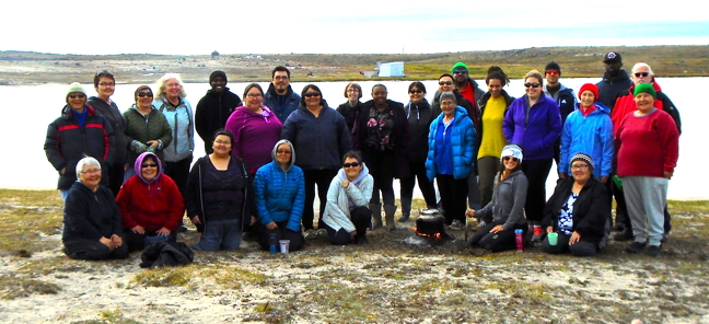 Staff at Netsilik Ilihakvik enjoy a Friday outing together, Aug. 11, soon after returning from summer holidays. “We went out for a ‘bonding’ I.Q. afternoon of fishing, chatting, making heather tea and bannock making over heather fire,” said principal Gina Pizzo. “It was a gorgeous day and everyone enjoyed the day.” (PHOTO COURTESY GINA PIZZO)
