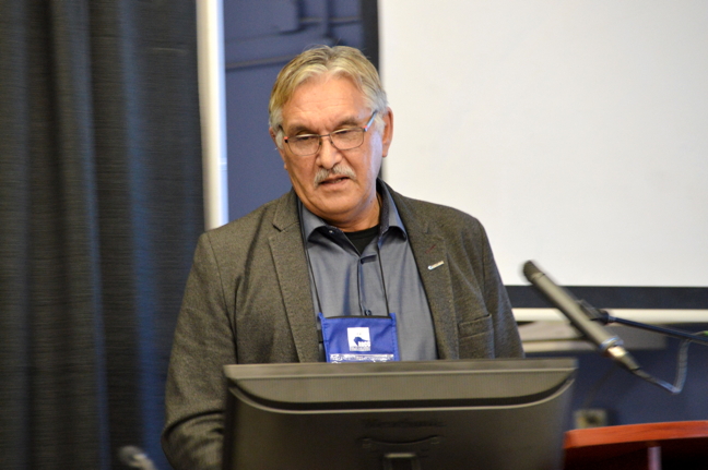 Six months into the rollout of the Government of Nunavut's updated Nunavummi Nangminiqaqtunik Ikajuuti, or NNI, policy—which grants benefits to local and Inuit-owned companies bidding on public tenders—representatives from the GN and Nunavut Tunngavik Inc. gave a crash course on the policy for Nunavut investors during a panel at the Nunavut Trade Show in Iqaluit, Sept. 20. But Qikiqtaaluk Corp. President, Harry Flaherty, above, who also sat on the panel, said there was room for improvement in the policy, which he said still leaves many bidders confused about the arithmetic used to adjust bids. Flaherty called for audits at the end of each contract to ensure companies adhere to Inuit employment and other requirements to be eligible for the benefits. He also called for increased transparency during the application of NNI bid adjustments. Flaherty also warned against companies winning NNI bid adjustments and then outsourcing to non-Inuit companies. 