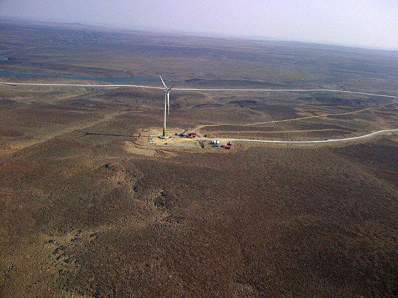 An 80-metre wind turbine near Glencore's Raglan nickel mine in Nunavik is a rare example of alternative energy use north of the treeline, where the use of alternative energy has been slow to catch on. The hamlets of Arviat and Kugluktuk hope to change that, through projects in which they've teamed up with an energy story firm called NStor. (FILE PHOTO)