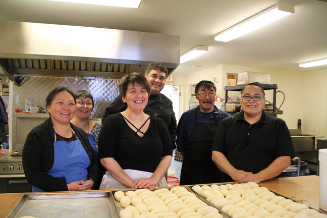 Iqaluit’s Qajuqturvik Society Food Centre and Inclusion Café are competing against community programs across Canada to win cash from the Aviva Community Fund. “We could receive up to $100,000 to help expand our programs. We’d be the first group in Nunavut to get support from this group that has given over $7 million to organizations all across Canada,” the food centre’s head chef Michael Lockley said. But, he also said that Iqaluit’s low population puts the community service at a disadvantage for winning because the contest is voter driven. The food centre serves over 5,000 meals per month and has a mandate to combat food insecurity in the city of Iqaluit. “In the harsh winter we give high-calorie meals because we know our clients need them to survive the Arctic cold,” the food centre says in its online competition bio. “And, we realize the meal they get from us may be the only meal they get that day.” Online voting for the competition, which has multiple stages, started Oct. 10 and runs to Oct. 19. Vote here: https://www.avivacommunityfund.org/. (PHOTO BY BETH BROWN)
