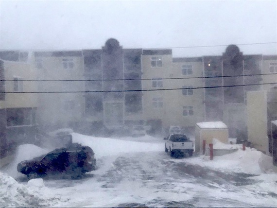 Another stay-at-home day in Iqaluit on Saturday, Nov. 25: the fourth storm since late September swung into Nunavut's capital with a big snowfall, between 10 to 20 cm, and northwest winds gusting to 70 km/hr, according to Environment Canada. Snow and blowing snow moved into Iqaluit during the night, and by early in the morning the City of Iqaluit had issued yet another notice that municipal services were suspended, while snow drifted across roads, particularly in the Plateau neighbourhood. Businesses and the post office remained shut, while bake sales and sports events were cancelled. Northmart invited road-clearing crews to come and get free hot coffee. Municipal services were restored at about 6:45 p.m. (PHOTO COURTESY OF CONNIE NOWDLUK)