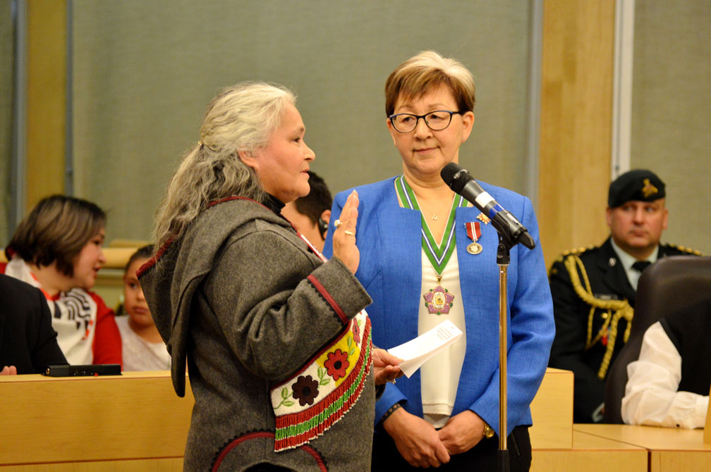 Iqaluit-Sinaa MLA Elisapee Sheutiapik, now the minister in charge of the Department of Economic Development and Transportation and the Department of Environment, along with four other portfolios, takes her oath of office Nov. 21. (PHOTO BY STEVE DUCHARME)