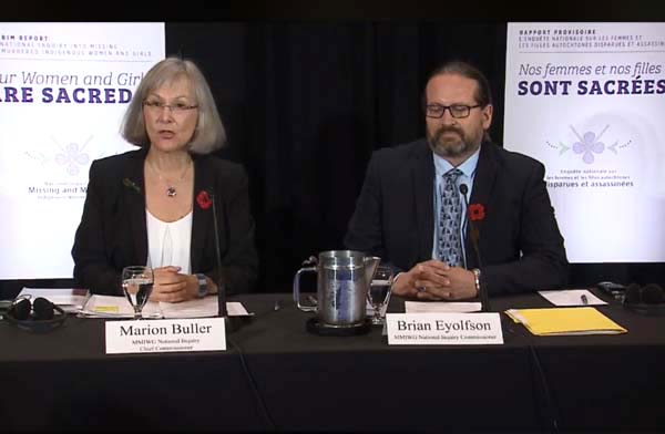 Marion Buller, chief commissioner of the National Inquiry in Missing and Murdered Indigenous Women, and commissioner Brian Eyolfson at a press conference held in Ottawa Nov. 1 to announce the release of the commissioner’s interim report, broadcast live on its Facebook page.