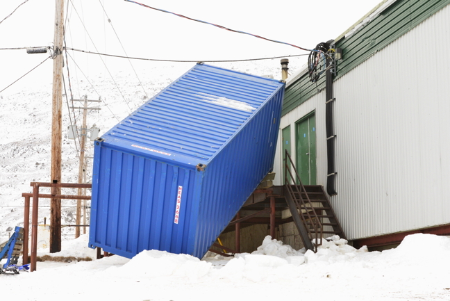 The aftermath of a couple of breezy days in Pangnirtung: This seacan behind the Northern Store in Pangnirtung was actually toppled by wind thanks to a fierce storm that blew through Nunavik, south Baffin and the Kivalliq region earlier this week. Pangnirtung resident Daniel Kuluguqtuq posted a photo on Twitter from Parks Canada employee Matthew Nowyook showing winds at the Auyuittuq National Park office maxed out at 209 km/h overnight on Nov. 20. Salluit, Quaqtaq, Kimmirut, Iqaluit and Pangnirtung all had winds approaching or exceeding 100 km/h this week. Rankin Inlet, Arviat and Coral Harbour also experienced blowing snow and winds of at least 76 km/h. (PHOTO BY DAVID KILABUK)