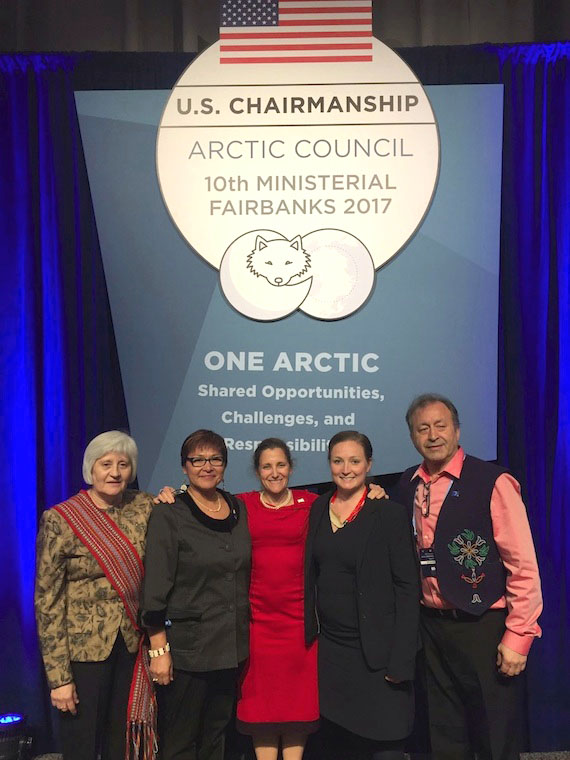 Diverse and international: Chrystia Freeland, Canada's foreign minister (middle), stands under the emblem of the May 2017 Arctic Council ministerial meeting in Fairbanks, Alaska, with the Indigenous permanent participant organization leaders from Canada, including Okalik Eegeesiak of the Inuit Circumpolar Council (second from left) and Bill Erasmus of the Arctic Athabaskan Council (far right). 