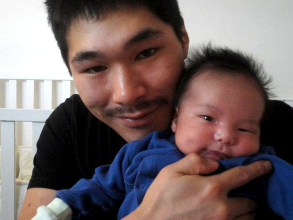 Baby Makibi and his father, Luutaaq Qaumagiaq, pose for a picture posted to Facebook on Jan. 25, 2012. (PHOTO COURTESY OF LUUTAAQ QAUMAGIAQ)