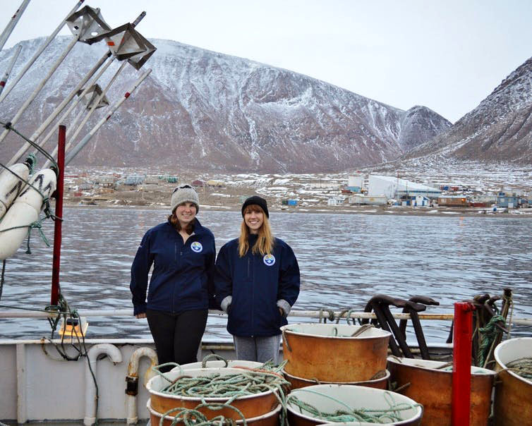 Researchers Brynn Devine (left) and Laura Wheeland aboard the vessel Kiviuq I off Grise Fiord in 2016. (AUTHOR PROVIDED)