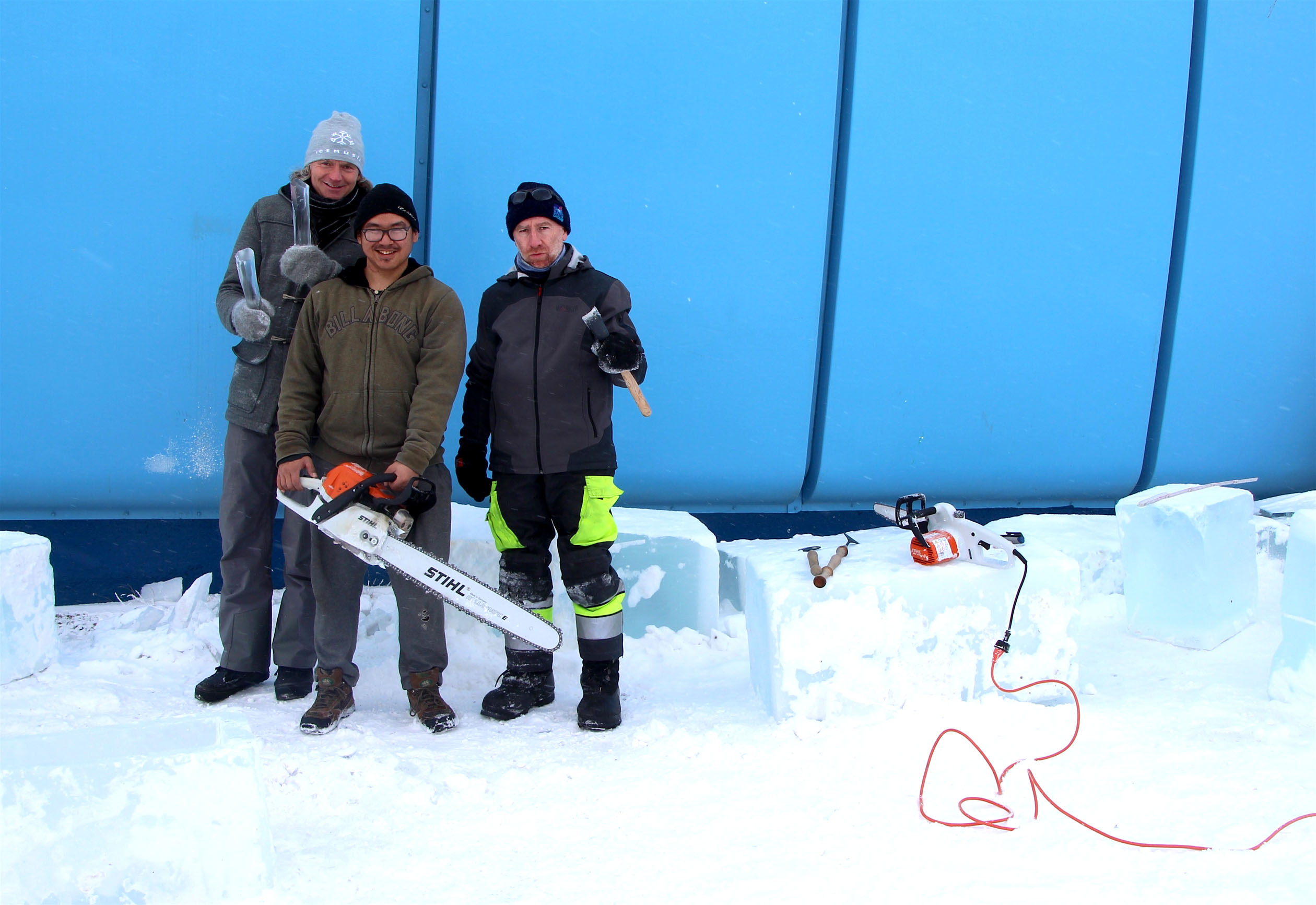 Ice Music’s Terje Isungset, left, Iqaluit’s Jimmy Nukiruaq and ice carver Eric Mutel cut these blocks of ice earlier this week.
(PHOTO BY BETH BROWN)
