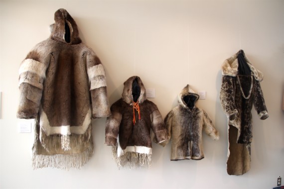 This family-sized set of seal- and caribou-skin parkas are typical of Baffin Inuit full fur coats, says Matty McNair, the curator of a new parka exhibit at the Nunavut legislature. (PHOTO BY BETH BROWN)