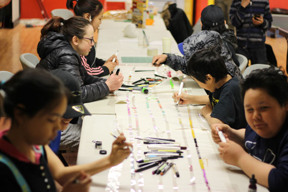 Students from Pangnirtung and Cape Dorset learn basic animations skills by drawing directly on 16mm film. (PHOTO RHODA NASHALIK) 