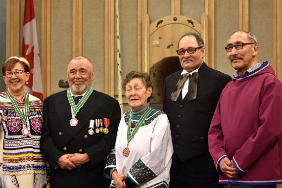 Ludy Pudluk and Betty Brewster are invested into the Order of Nunavut at a ceremony held in the chamber of the legislative assembly on Tuesday, June 5. They’re seen here with Nunavut Commissioner Nellie Kusugak standing at the far left. To their right is Joe Enook, the legislature’s speaker and chair of the Order of Nunavut advisory council, and Premier Paul Quassa. The award recognizes individuals who have made outstanding contributions to the cultural, social or economic well-being of Nunavut. It is the highest honour of Nunavut. Attendees celebrated Brewster's several-decade career as an interpreter-translator, and Pudluk's contributions, as a longtime MLA for the High Arctic, to the creation of Nunavut. (PHOTO BY COURTNEY EDGAR)