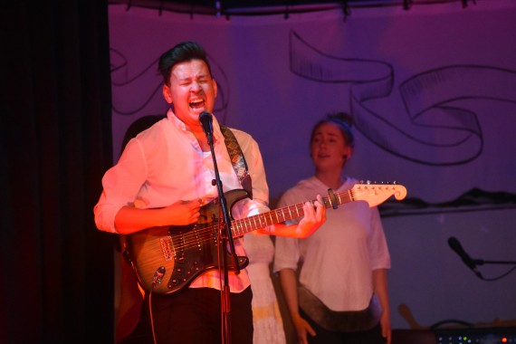 Hans-Henrik Suersaq Poulsen from Greenland performs with the Dream Collaboration collective at Alianait's closing concert Monday night. Some other musical acts from the weekend festival accompanied him on stage with music and dance. (PHOTO BY COURTNEY EDGAR)