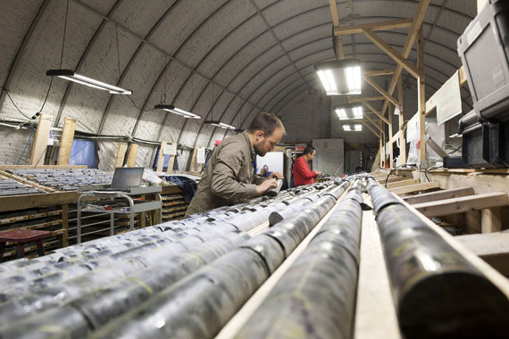 Production is on schedule for the fall of 2019 at Agnico Eagle’s Whale Tail deposit, thanks to an approved water licence. Here workers inspect core samples from the company’s Amaruq project. (FILE PHOTO)