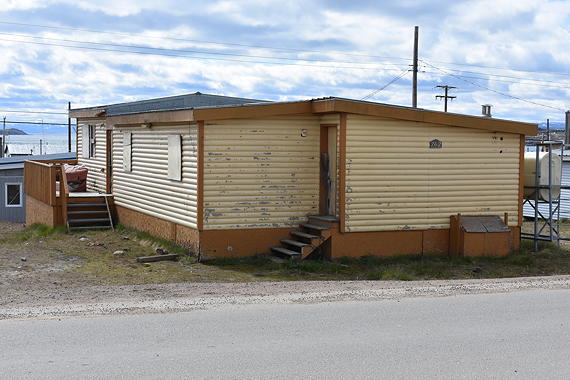 This abandoned house on Fred Coman St. in Iqaluit was once a youth cottage and transitional homeless shelter in the late 1990s and early 2000s. It has stood unused for over a decade since the Illitiit Society dissolved. (PHOTO BY COURTNEY EDGAR)