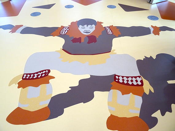 A dancer by Sammy Kudluk of Kuujjuaq is one of several designs on the floors of the knowledge-sharing centre in the main building of the Canadian High Arctic Research Station in Cambridge Bay. 