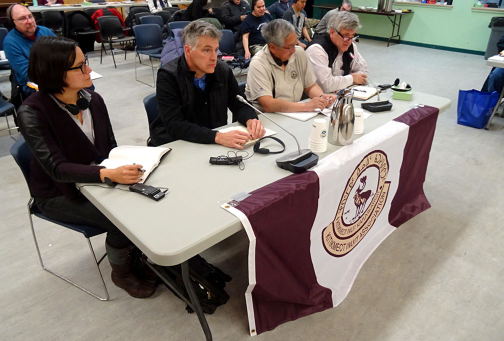Representatives of the Nunavut Resource Corp. appear before the annual general meeting of the Kitikmeot Inuit Association on Oct. 16, 2017. The NRC, wholly owned by the KIA, has been the entity that handles the Grays Bay Port and Road proposal. From left to right: lawyer Jennifer King; lawyer Rod Northey; NRC President Charlie Evalik; and Scott Northey, NRC's chief operating officer. (PHOTO BY JANE GEORGE)