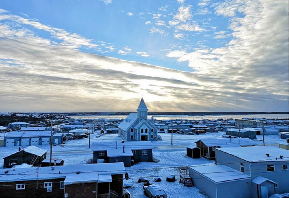The sunrise shines upon St. Stephen's Anglican Church in Kuujjuaq on Thursday, Nov. 15. The new church opened in September. (PHOTO COURTESY OF LUCY ABRAHAM)