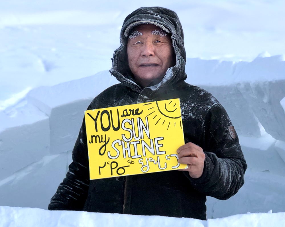 Leo Maktar won first place in the igloo-building contest on Saturday, Feb. 2 in Pond Inlet during the Return of the Sun festivities. He was awarded a round-trip helicopter ride to Sirmilik National Park this July. (Photo © Carey Elverum)