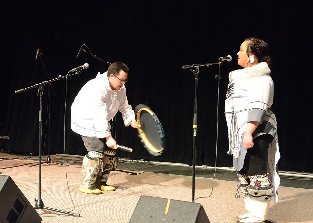Janice Gordon Parsons and Sandy Emudluk throat sing, drum dance and sing traditional Inuit songs during their winning performance at Kuujjuaq’s Got Talent show held at the Katittavik Town Hall on Saturday, Feb. 16. (Photo by Isabelle Dubois)