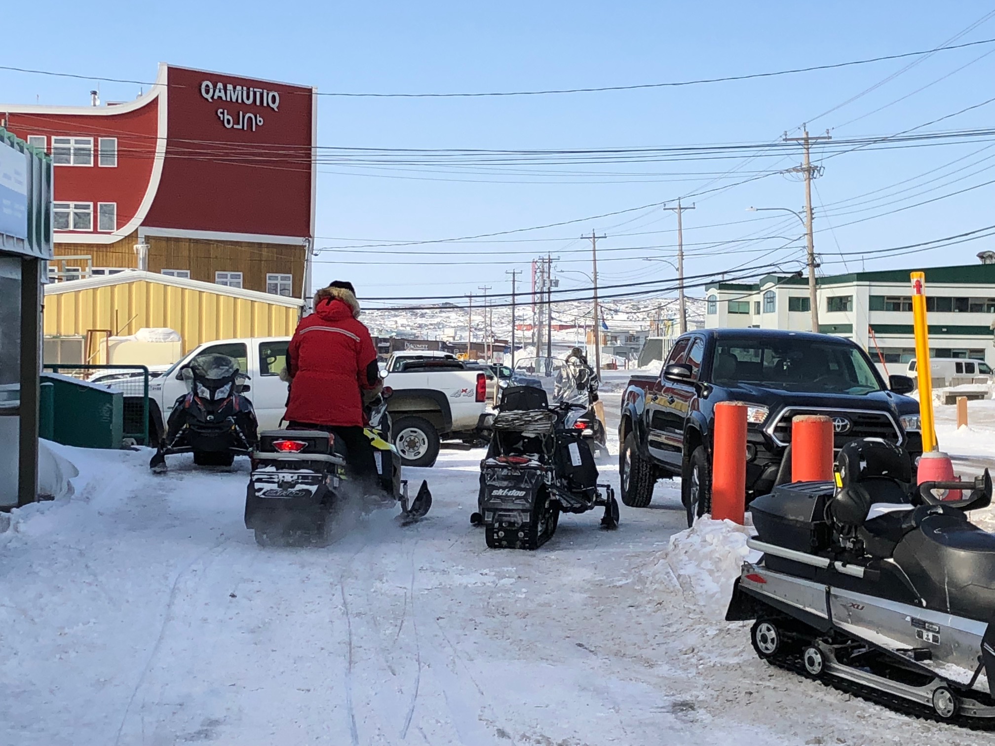 Searchers on snowmobiles have been looking around Iqaluit for Ambar Roy, but without success. On Tuesday evening the Nunavut RCMP reported that searchers have not yet located Roy, the 18-year old who went missing on March 13. On Tuesday, Nunavut Emergency Management co-ordinated 34 volunteer and RCMP snowmobile operators to search an area about 10 kilometres NNE of Iqaluit. “Unfortunately, the search teams were unable to locate Ambar or any articles of clothing he was last seen wearing,” police said. They also said that snow storms on Saturday and Monday “hampered the search areas.” You can read more about the search for Roy on Nunatsiaq News. (Photo by Jane George)