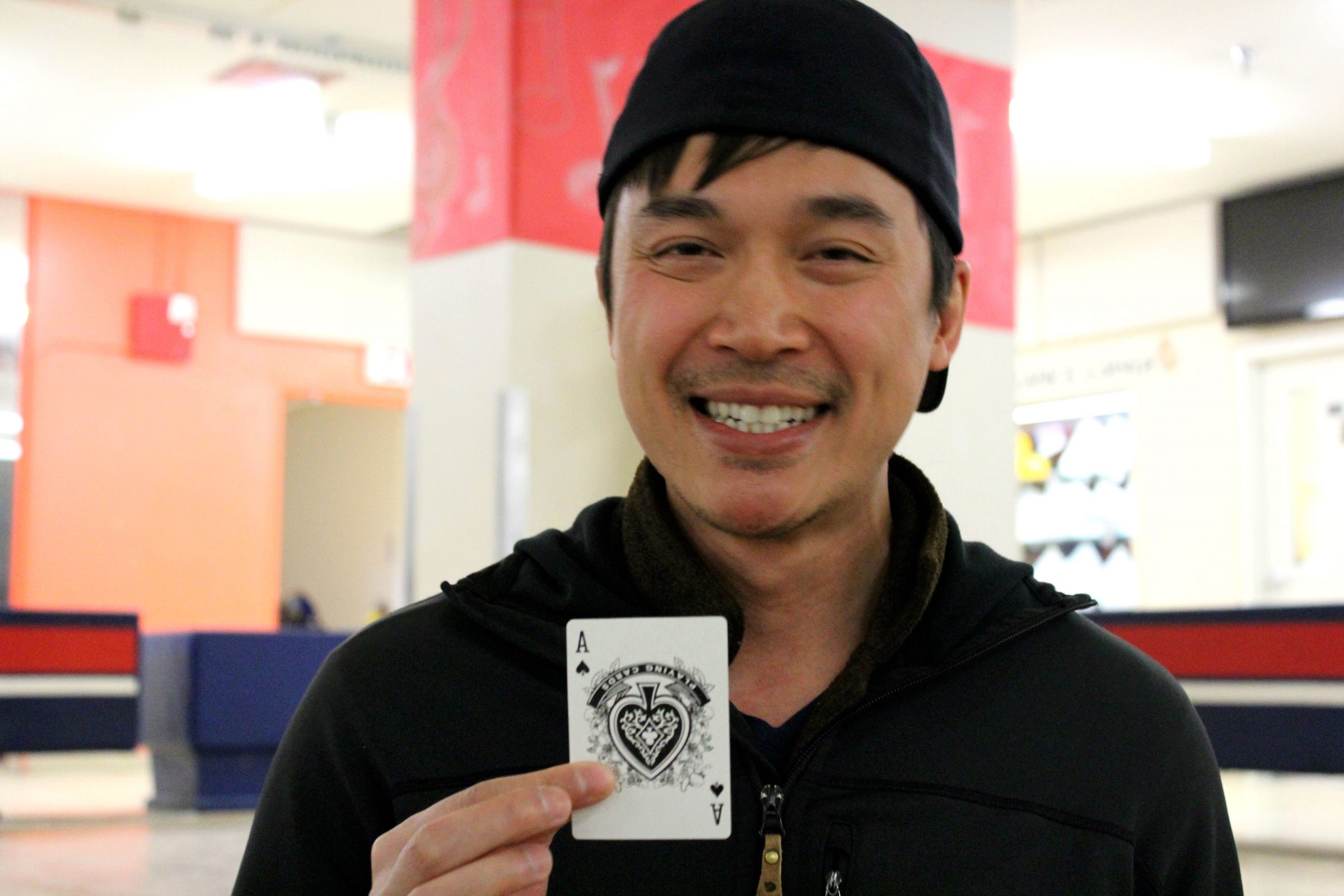 John Nguyen, pictured here, and three others who work together in IT for the Government of Nunavut, have won a total of $208,042 through a fundraising campaign by Iqaluit’s Inuksuk High School called Chase the Ace. The draw took place Thursday, June 27 at the high school. Nguyen, along with is teammates Karri Gillis, Olu Esho and Joseph Eze, will split the prize four ways, making it about $52,000 each. Nguyen said he had bought about 40 tickets in total, which sold for $10 each. The money raised from Chase the Ace will help send 22 Inuksuk students to the South Pacific and a U-18 soccer team from Iqaluit to the U.K. for a tournament and training opportunity. Nguyen said he’s not sure what he’ll do with the money, but said he will “sleep on it for now.” (Photo by Emma Tranter)